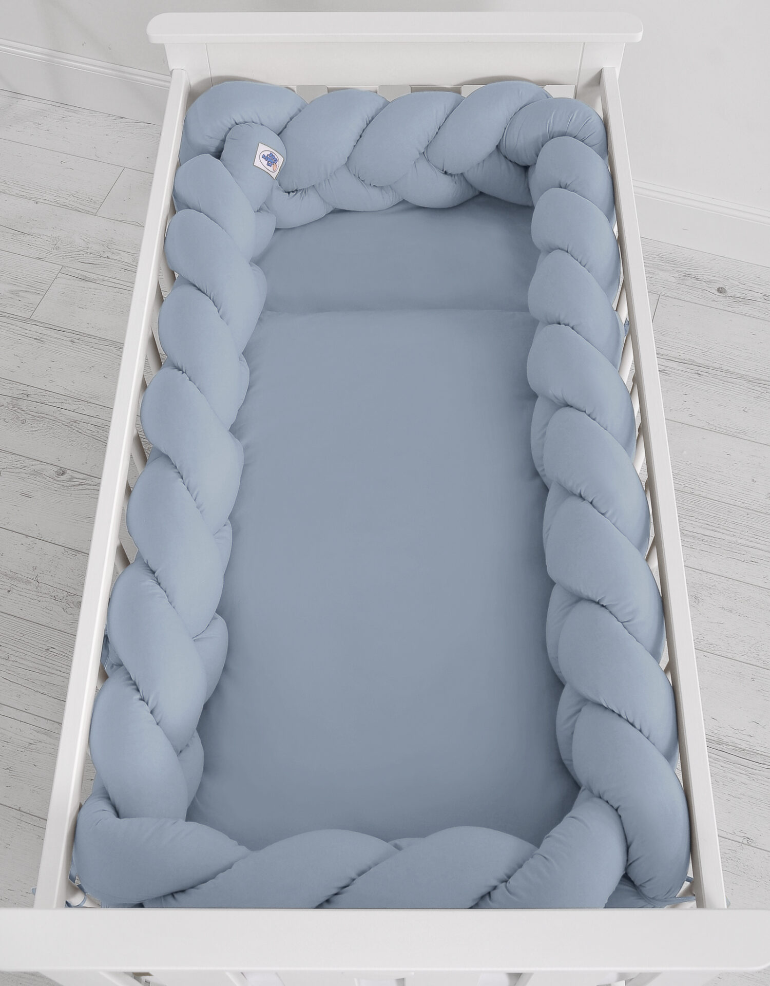 Tour de lit tressé bleu pastel